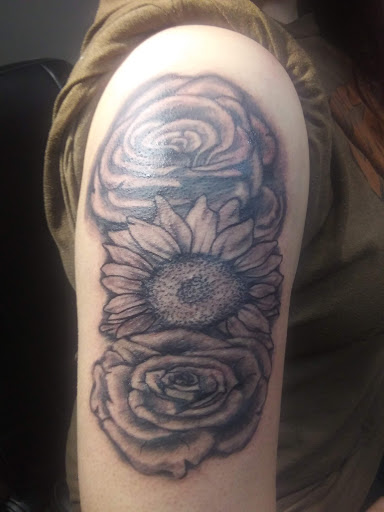 Explore tattoo ideas of dogs, creative tattoo ideas in Scottsboro, available at 5 Points Tattoo