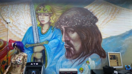 Tattoo Shop «Shrunkin Head Tattoo», reviews and photos, 4438 St John Ave, Kansas City, MO 64123, USA