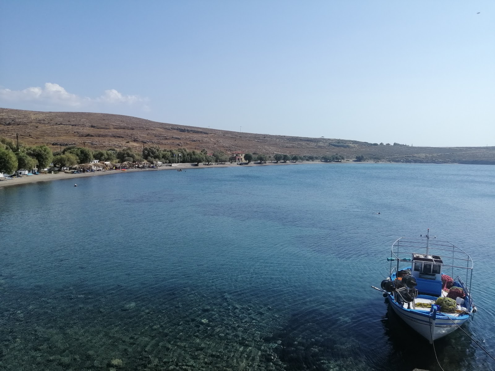 Photo of Sigri beach with turquoise pure water surface