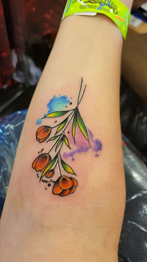 Explore hand tattoo ideas for females, creative tattoo ideas in Forney, available at Royal Circle Tattoo studio