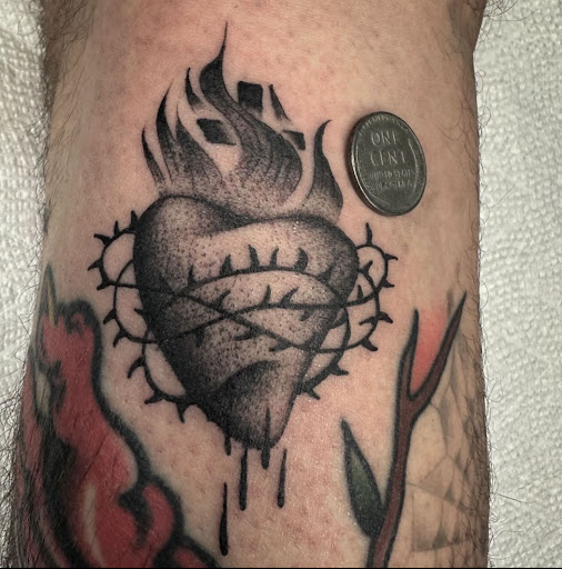 Explore hand tattoos for men ideas, creative tattoo ideas in Atlanta, available at Big Cat Tattoo