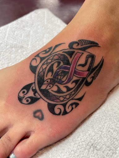 Explore small hummingbird tattoo ideas, creative tattoo ideas in Cedar Falls, available at Red Owl Tattoo