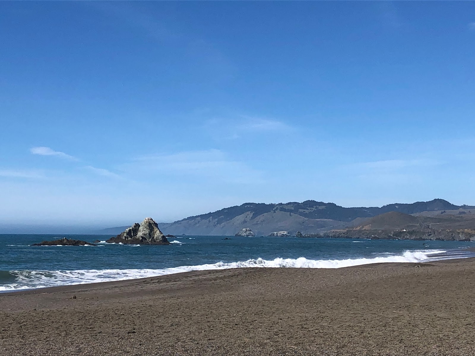 Photo of Wrights Beach surrounded by mountains