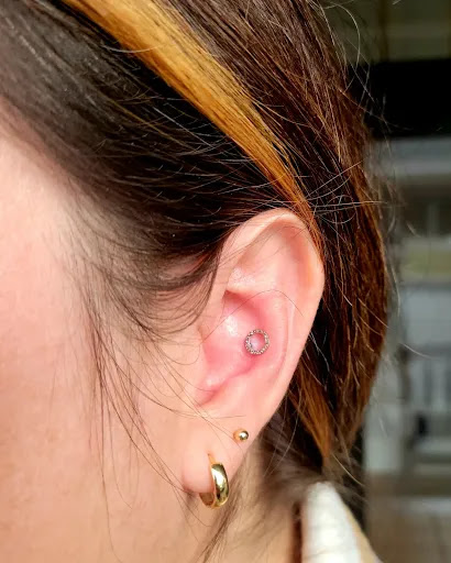 Explore rock and roll tattoo ideas, creative tattoo ideas in Greer, available at Some Prix Piercing