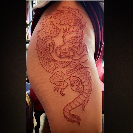 Explore female calf tattoo ideas, creative tattoo ideas in Miami, available at Green Machine Tattoos & Body Piercing