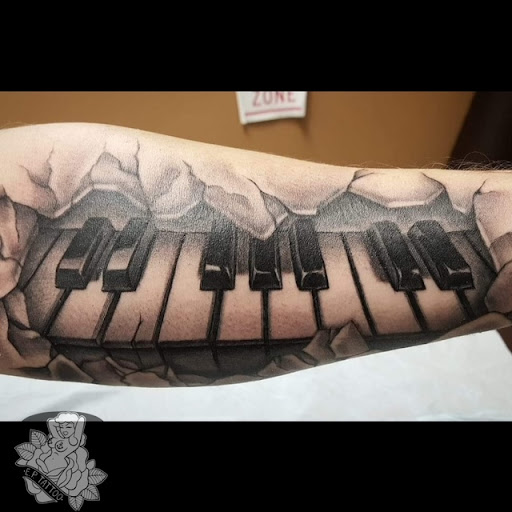 Explore navy anchor tattoo ideas, creative tattoo ideas in Glen Burnie, available at Exotic Pleasures Tattoo & Piercing