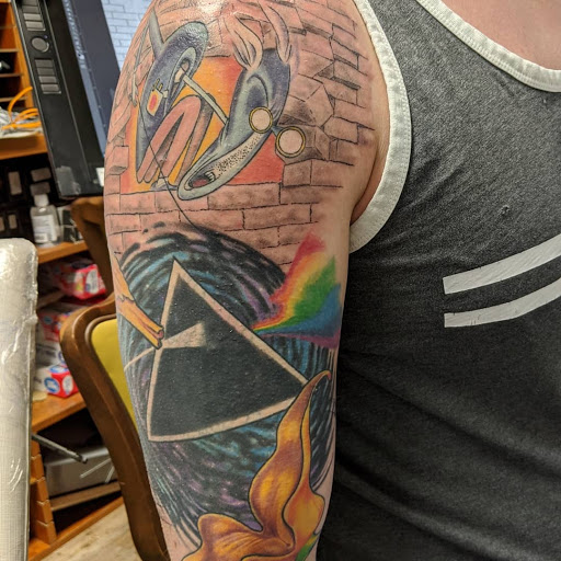 Explore vienna billy joel tattoo ideas, creative tattoo ideas in Tewksbury, available at Lucid Arts Tattoo Studio