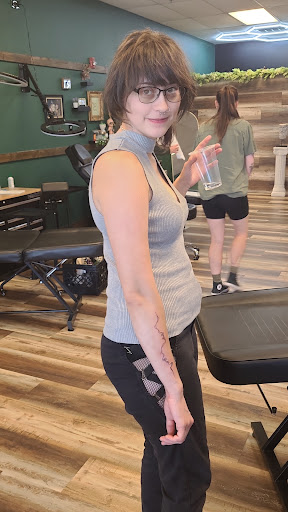 Explore black mamba tattoo ideas, creative tattoo ideas in Biloxi, available at Artisan Ink Studio