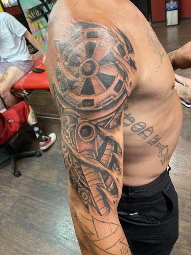Explore pistol tattoo ideas, creative tattoo ideas in Bullhead City, available at Smoke and Dagger Tattoo