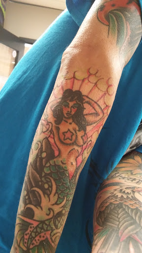 Explore back tattoo cover up ideas, creative tattoo ideas in Jessup, available at Savage Ink Tattoo Studio