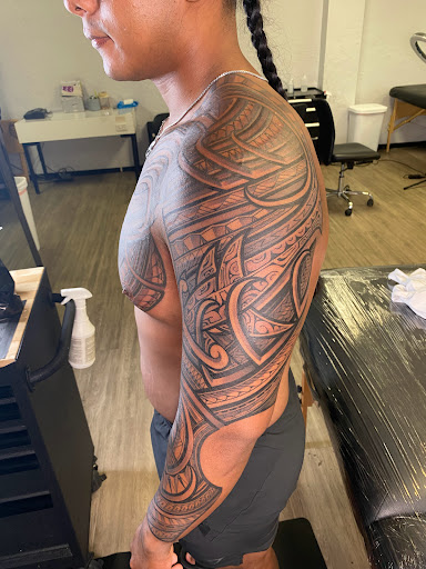 Explore butterfly spine tattoo ideas, creative tattoo ideas in Kailua Kona, available at Packing Ink Tattoos