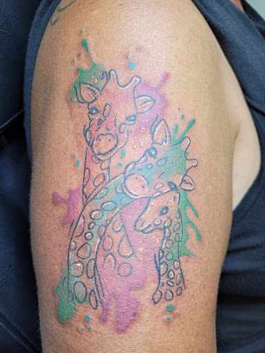 Explore tattoo ideas for first born son, creative tattoo ideas in Angola, available at Hoodlum Ink