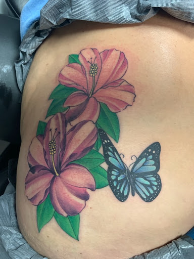 Explore charizard tattoo ideas, creative tattoo ideas in Wake Forest, available at Revelation Ink Tattoo and Piercing