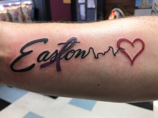 Explore xenomorph tattoo ideas, creative tattoo ideas in Milwaukee, available at Bay Street Tattoo Co.