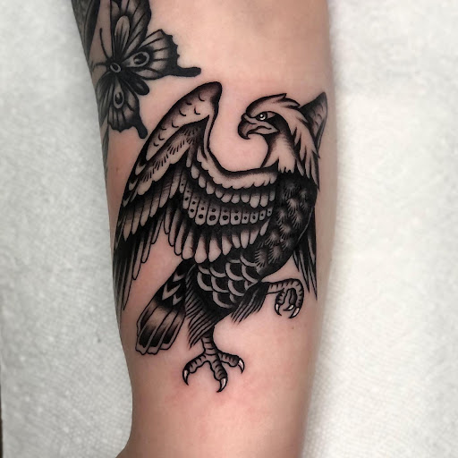 Explore monkey tattoo ideas, creative tattoo ideas in Oakwood, available at Victory Tattoo Co