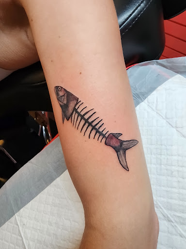 Explore child tattoo ideas for dad, creative tattoo ideas in Minocqua, available at Walking Arts Tattoos