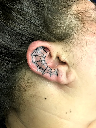 Explore mirrored tattoo ideas, creative tattoo ideas in New Kensington, available at BLUE HERMIT TATTOO