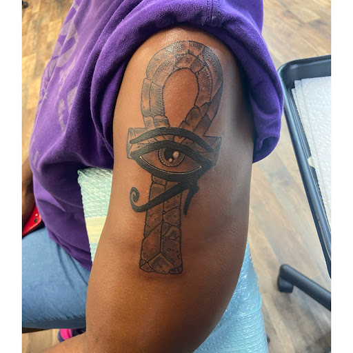 Explore stomach tattoo ideas for women, creative tattoo ideas in Ocala, available at The Black Sheep Tattoo Shop