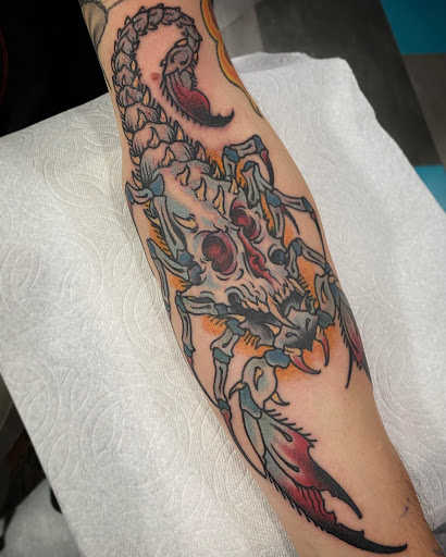 Explore gun tattoo ideas, creative tattoo ideas in Cleveland, available at GRIM HEART TATTOO