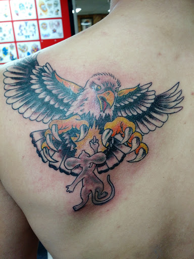 Find tattoo between breast ideas for your next unique tattoo in Black River Falls at Black River Tattoo