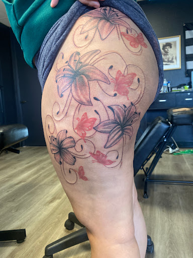 Explore flower ankle tattoo ideas, creative tattoo ideas in Apple Valley, available at 21st Vintage Tattoo