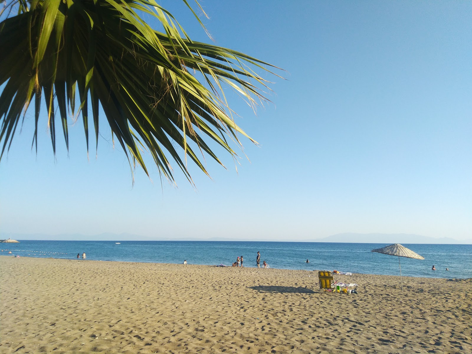 Photo de Gumuldur beach avec un niveau de propreté de assez propre