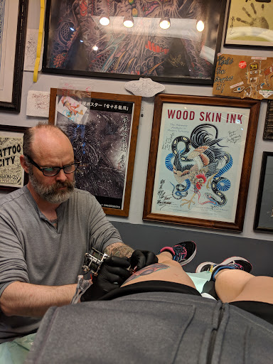 Explore men's back shoulder tattoo ideas, creative tattoo ideas in Boulder, available at Bolder Ink