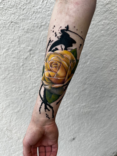 Explore upper arm tattoo ideas for guys, creative tattoo ideas in Madison, available at A Dead Anchor Tattoo