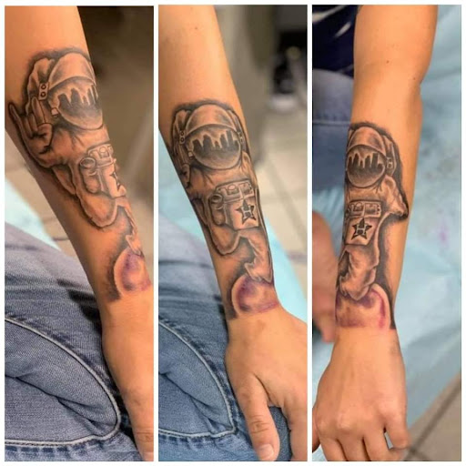 Explore dirt bike tattoo ideas, creative tattoo ideas in Houston, available at 333 Tattoo Studio HTX