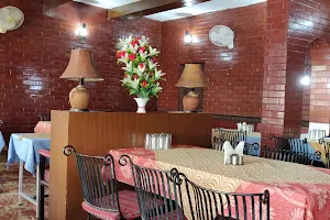 Raj Hotel Restaurant And Rooms image