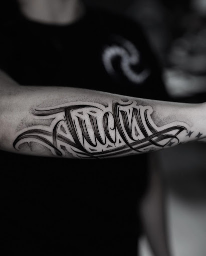 Explore silver lining tattoo ideas, creative tattoo ideas in Corona, available at Crop Circles Tattoo Studio