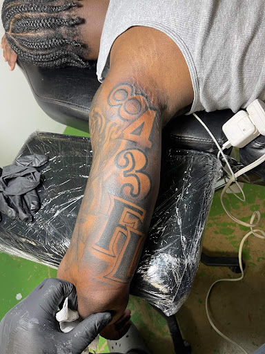 Explore chest tattoo ideas for guys, creative tattoo ideas in Greenville, available at S.O.S Symbols of Sophistication Tattoos