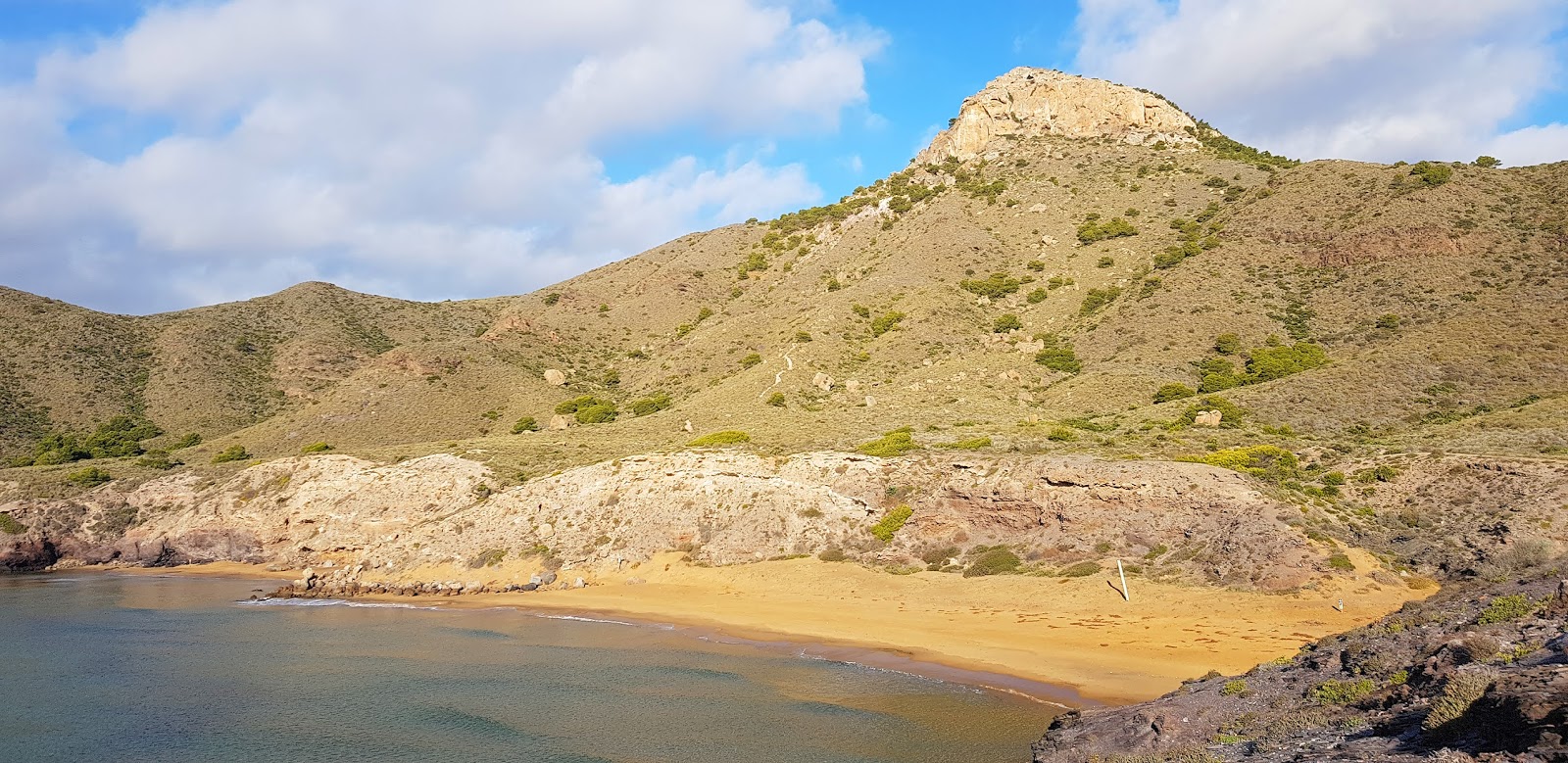 Foto van Punta Parreno met bruin zand oppervlakte