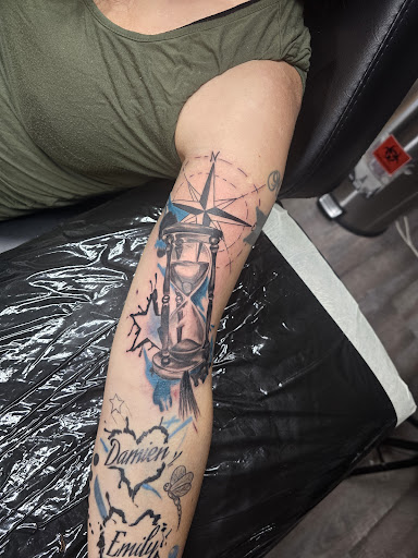 Explore religious elbow tattoo ideas, creative tattoo ideas in Vidalia, available at Freedom Ink Tattoo