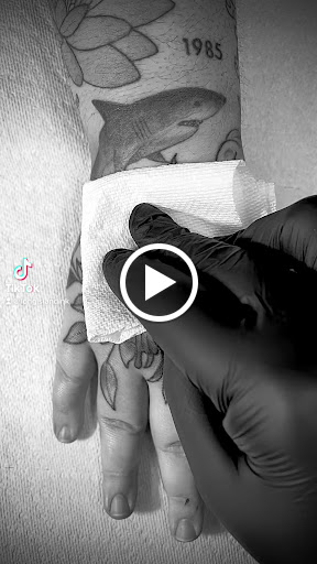 Explore street signs tattoo ideas, creative tattoo ideas in Douglasville, available at Long Island Ink Tattoo & Piercing