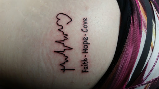 Find cat tattoos ideas for your next unique tattoo in Erie at EliKingInk