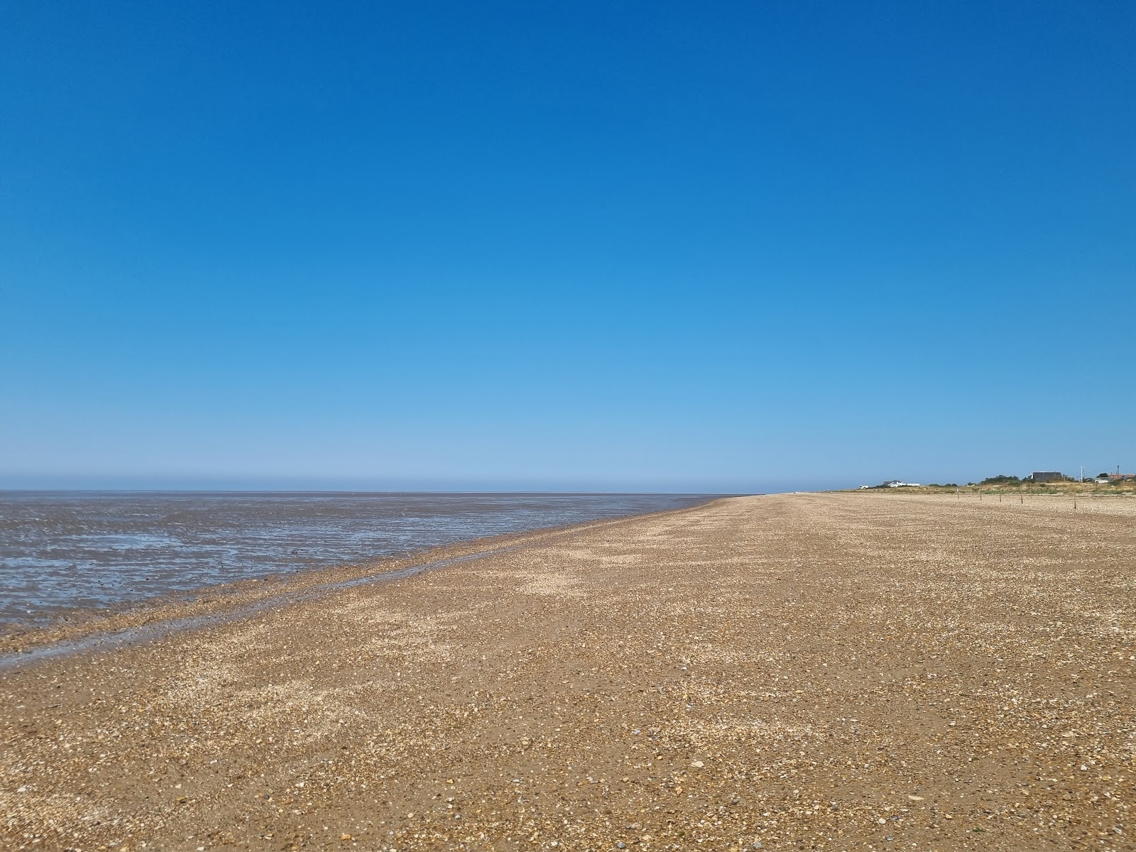 Fotografija Snettisham plaža z lahki fini kamenček površino
