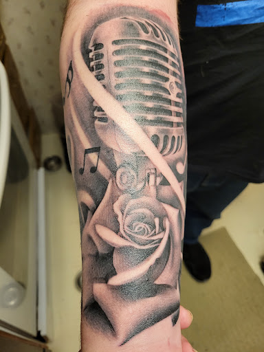 Explore cute behind the ear tattoo ideas, creative tattoo ideas in Hagerstown, available at Olde Line Tattoo Gallery