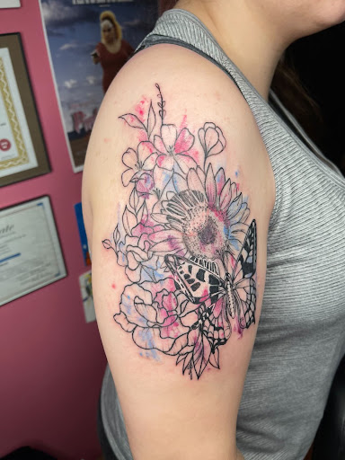 Explore cherry blossom tattoo ideas, creative tattoo ideas in Morrilton, available at Pink Flamingo Tattoo