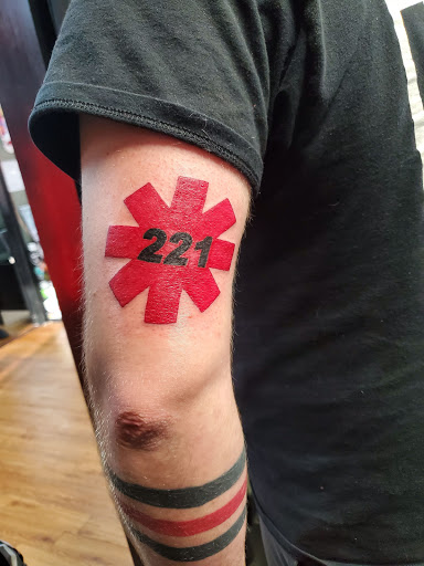 Explore small book tattoo ideas, creative tattoo ideas in Anderson, available at Painted Pony Tattoo & Piercing