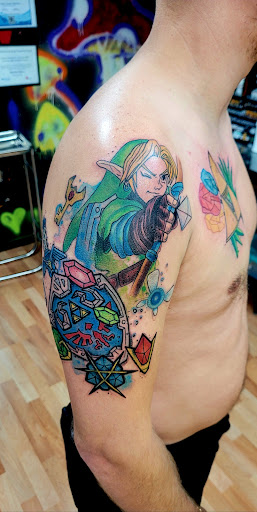 Explore back tattoo ideas for females, creative tattoo ideas in Benton, available at Spectrum Tattoo