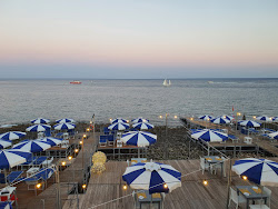 Foto de Spiaggia di Leuca rodeado por montanhas