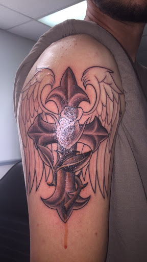 Explore hippie tattoo ideas, creative tattoo ideas in Fredericksburg, available at Ugly Bishops Tattoo Shop