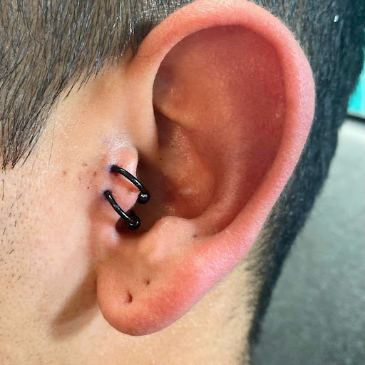 Explore military dog tag tattoo ideas, creative tattoo ideas in Nampa, available at Hippie Hoops and Holes