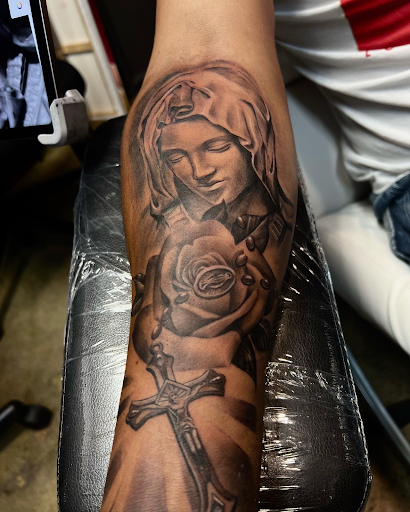 Find addams family tattoo ideas for your next unique tattoo in Dallas at Empire barbers & Ink