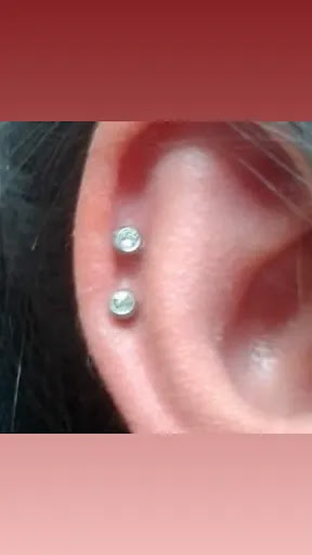 Explore feminine cross tattoo ideas, creative tattoo ideas in Hialeah, available at Allstar Tattoo & Body piercing