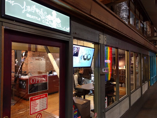 Explore maiden name tattoo ideas, creative tattoo ideas in Seattle, available at Laughing Buddha Seattle