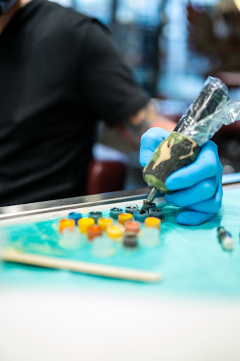 Explore tattoo ideas for dads with daughters, creative tattoo ideas in Las Vegas, available at Revolt Tattoos