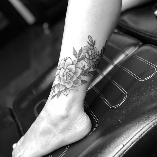 Explore dog tattoo ideas for females, creative tattoo ideas in Loveland, available at R&G Body Art