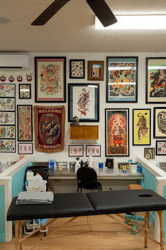Explore feminine cross tattoo ideas, creative tattoo ideas in Monterey, available at Gold Coast Tattoo and piercing